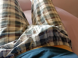 Twink cute boy throbbing dick under his plaid trousers pajama