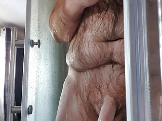 Shower after pissing on my hairy body. Some cock play 