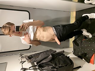 Twink jerk in fitting room and cum on the mirror 