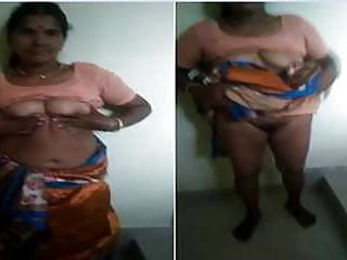 Indina desi telugu aunty showing her boobs and pussy