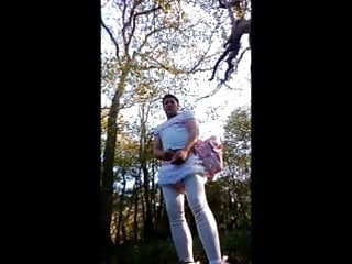 Sissy Hugh thompson walksing in the woods and being naughty