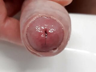 Cumshot close up - wet foreskin