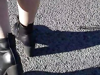 Girl Walking in pantyhose ans boots