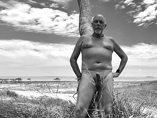 Playing outside at the beach erect...