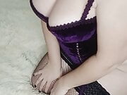 Curvy blonde in stockings and corset showing asshole