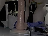Playing around with a thrusting dildo