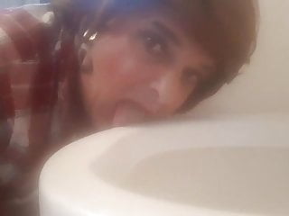Stephanie Cockwhore licks dirty urinal clean