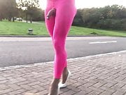 Public road walking in pink leggings.