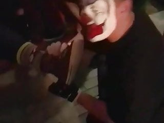 Clown Having Some Feet On His Face