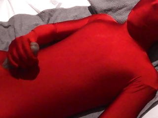 Red Zentai Twink Finishes Off Handjob...