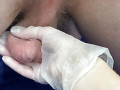 trying to milk cum to my lover in latex gloves