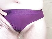 Wet dirty purple cotton panties in tub