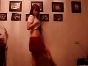 Redhead schoolgirl dancing