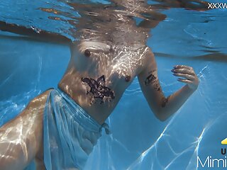  video: Finnish blonde tattooed pornstar Mimi underwater