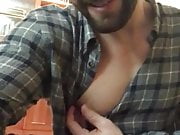sexy guy playing with his nipple