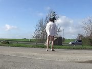 crossdresser on a road parking lot sounding in garter belt 5