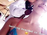 Madison Grace Reed in bikini top, getting her hair braided