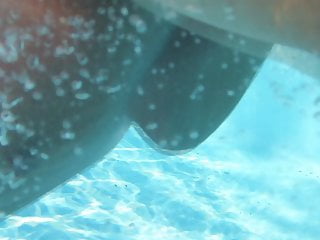 mature underwater in swimming pool 