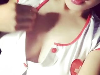 Asian girl nurse costume tease...