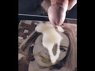 Cumtribute slow motion on womans face...
