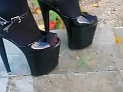 Lady L walking xtreme high heels glas road.(video short ver)
