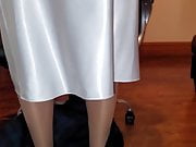 Pleated skirt with white satin half slip