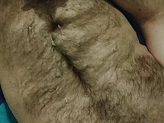 Hairy guy works his hole and...