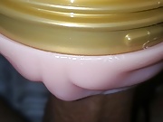 Bouncing toy on thick black dick