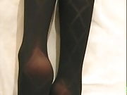 Black opaque diamond stockings with foot play