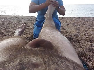 Nude massage on the beach