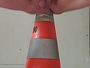 I sit on a construction cone