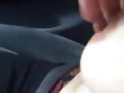 playing with tits on car