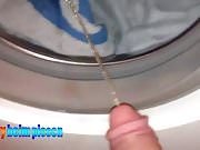 Andy pees in a washing machine